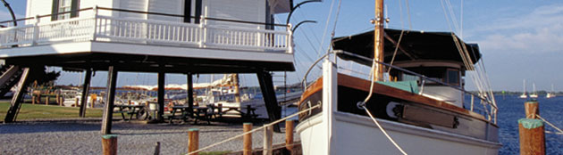 lighthouse and boat