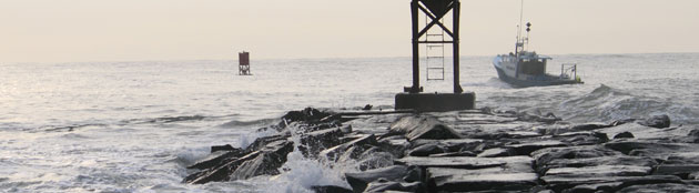 Boats passing through the Ocean City Inlet into the Atlantic Ocean