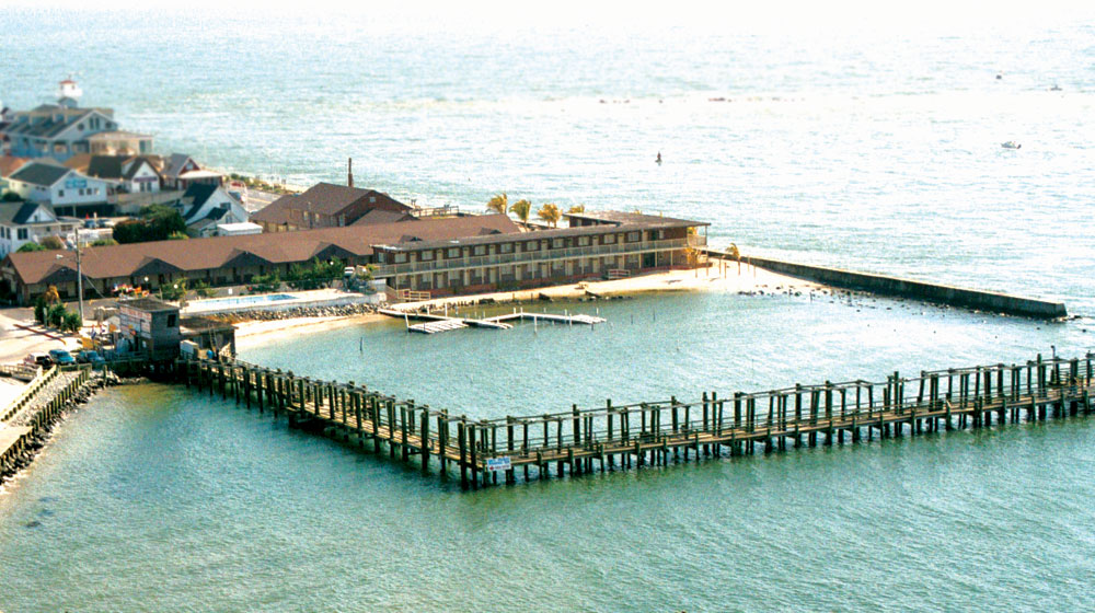We are located directly on the bay with a small beach and a large fishing pier.