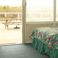 The ground floor oceanfront room has a large patio outside the door with picnic tables.